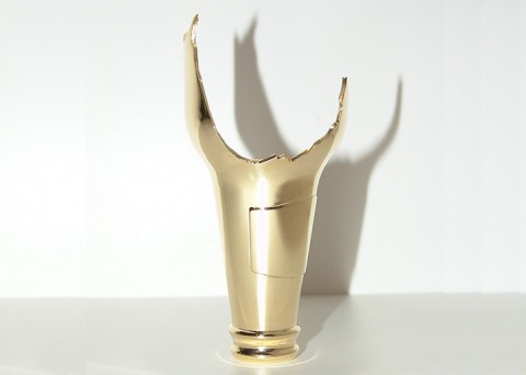 Solid gold broken bottle sculpture by Kendell Geers