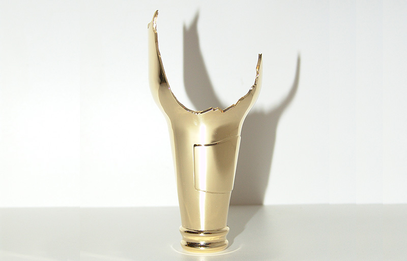 Solid gold broken bottle sculpture by Kendell Geers
